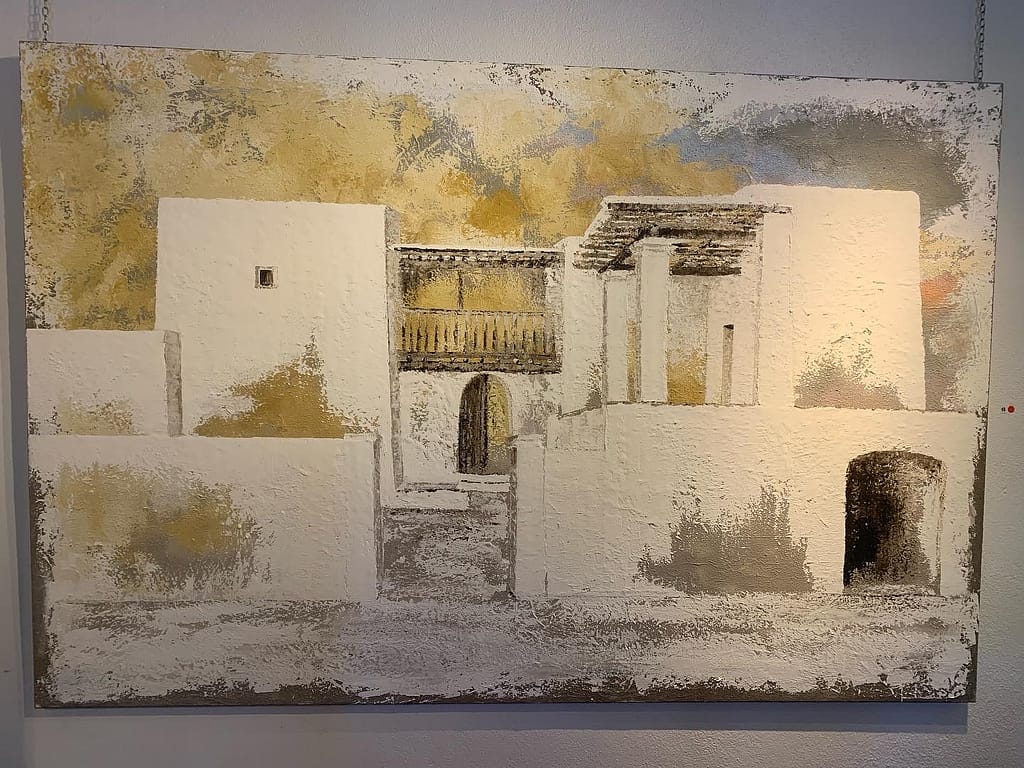 Fachada de casa payesa en cuadro de la artista ibicenca Julia ribas en su exposición de Can Tixedó